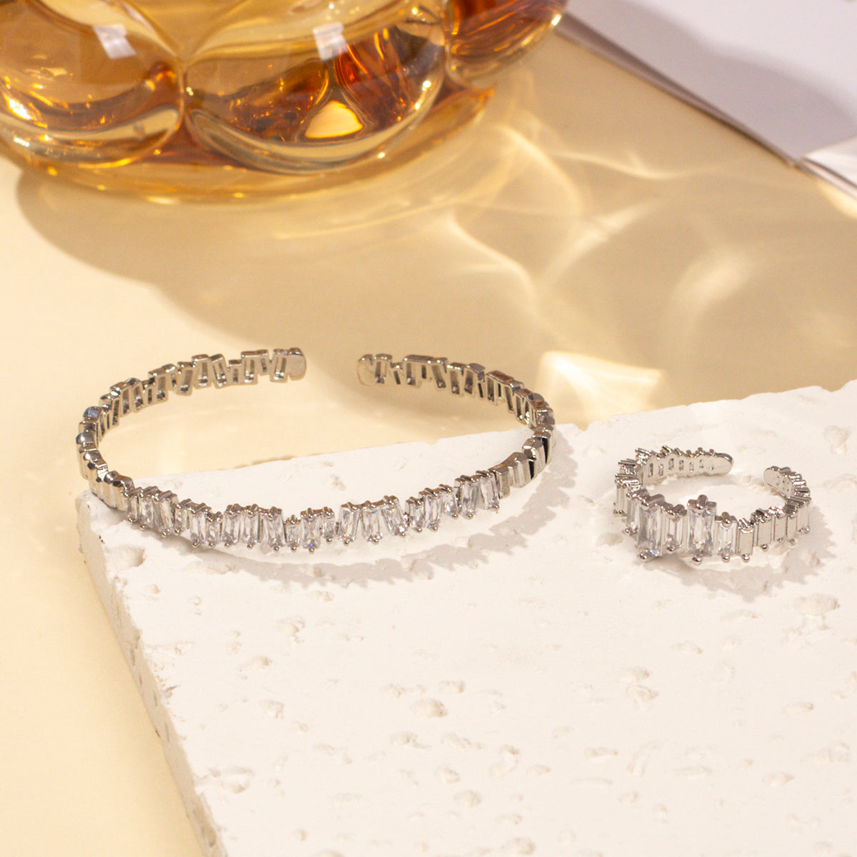 Cubic zirconia open bangle with sparkling stones, close-up