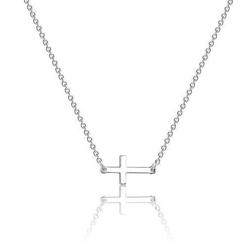 Dainty horizontal cross necklace worn on a woman